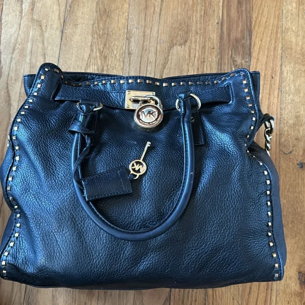 micheal kors black and gold stitched hamilton bag  with lock & key